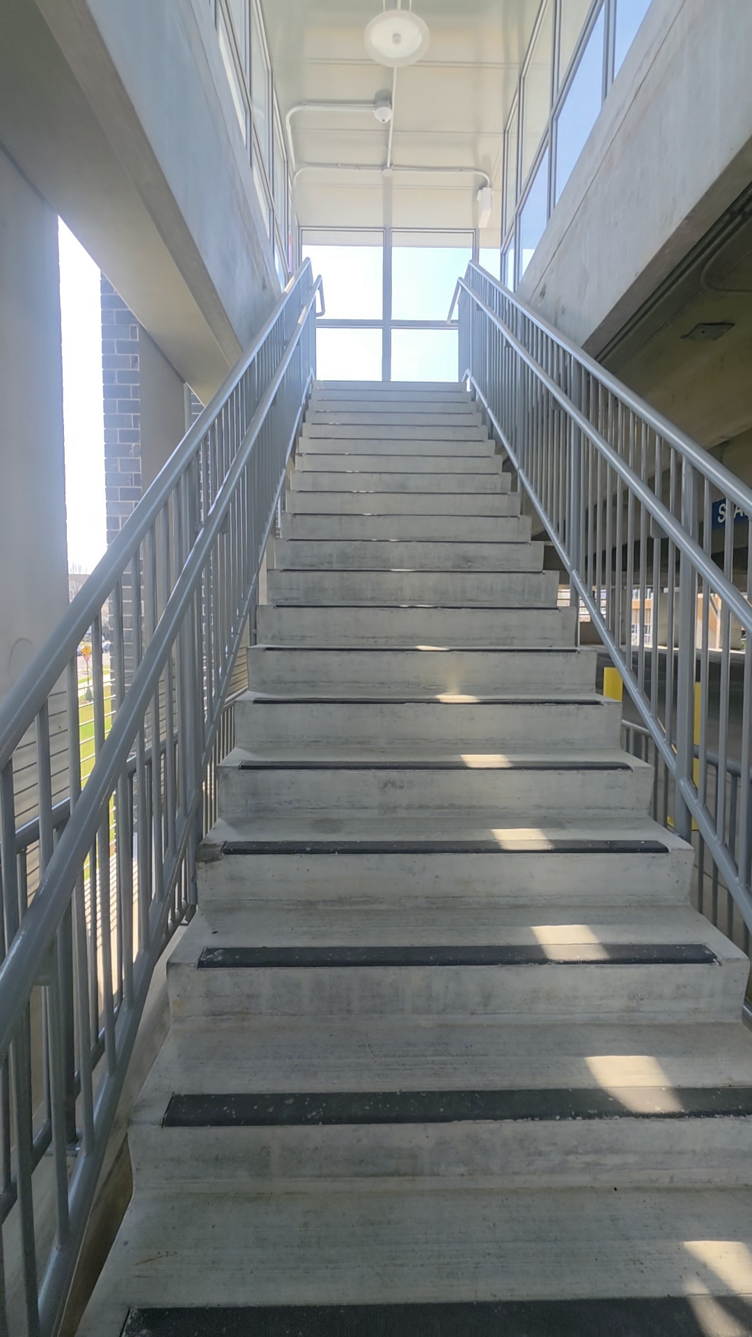 Galvanized commercial stair tower with railings