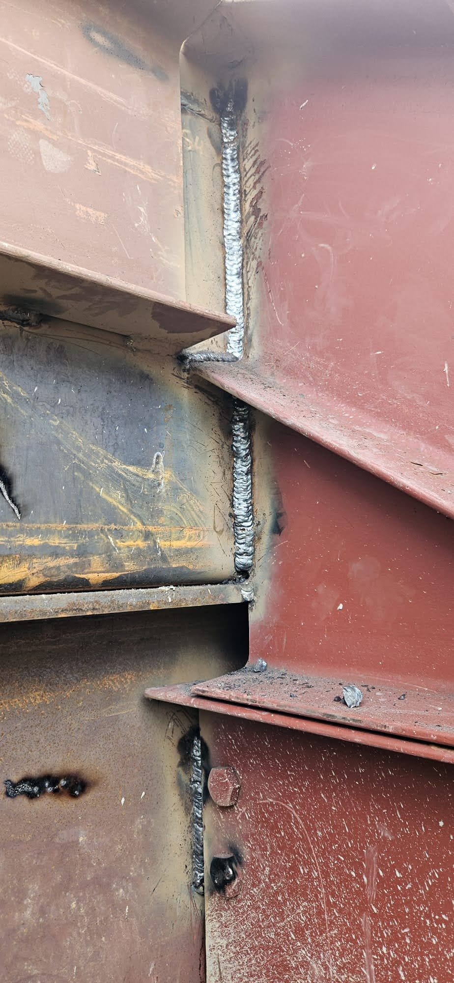 Full-penetration beam-to-column field welds on structural steel