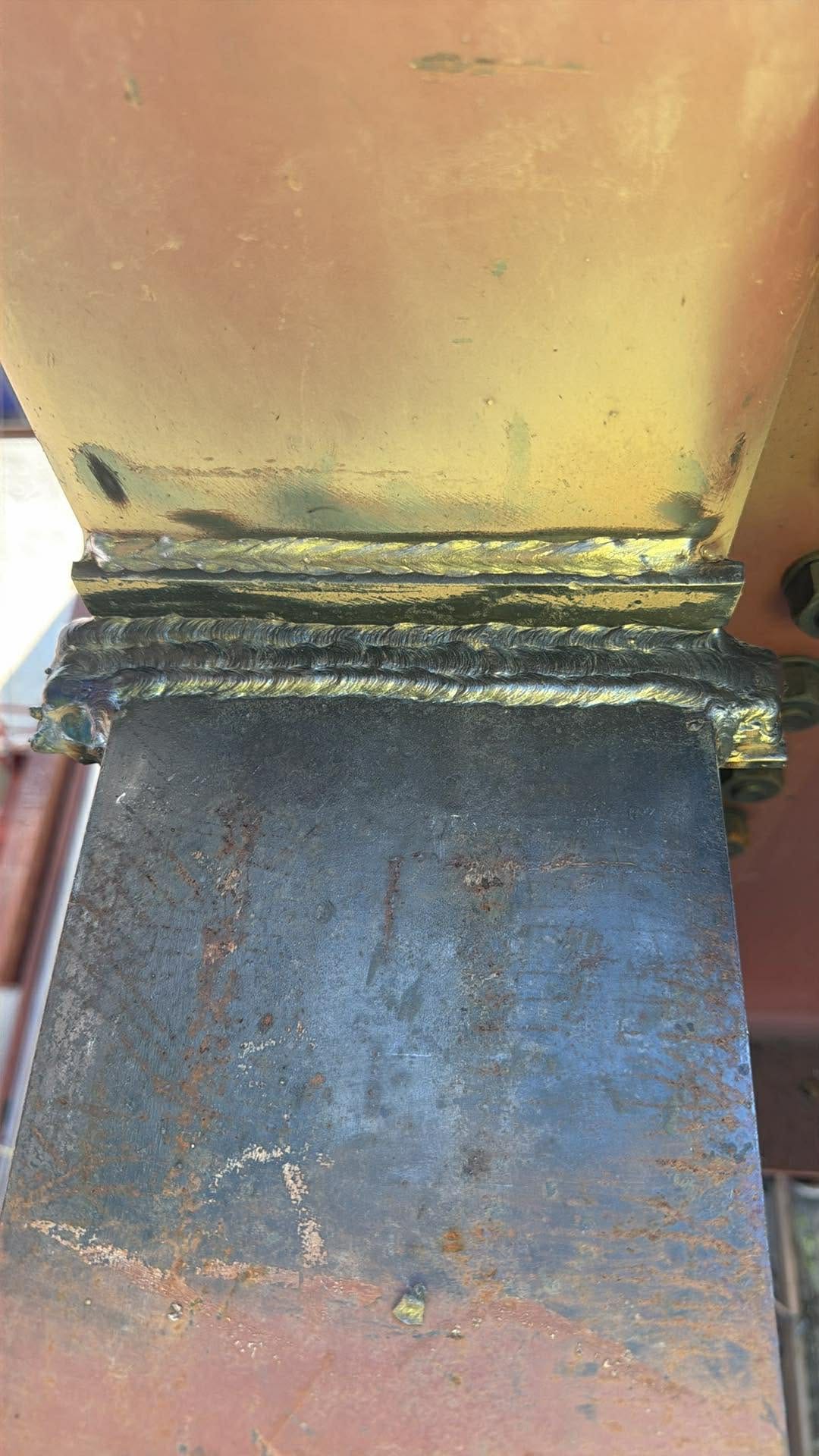 Multi-pass welded column base plate connection