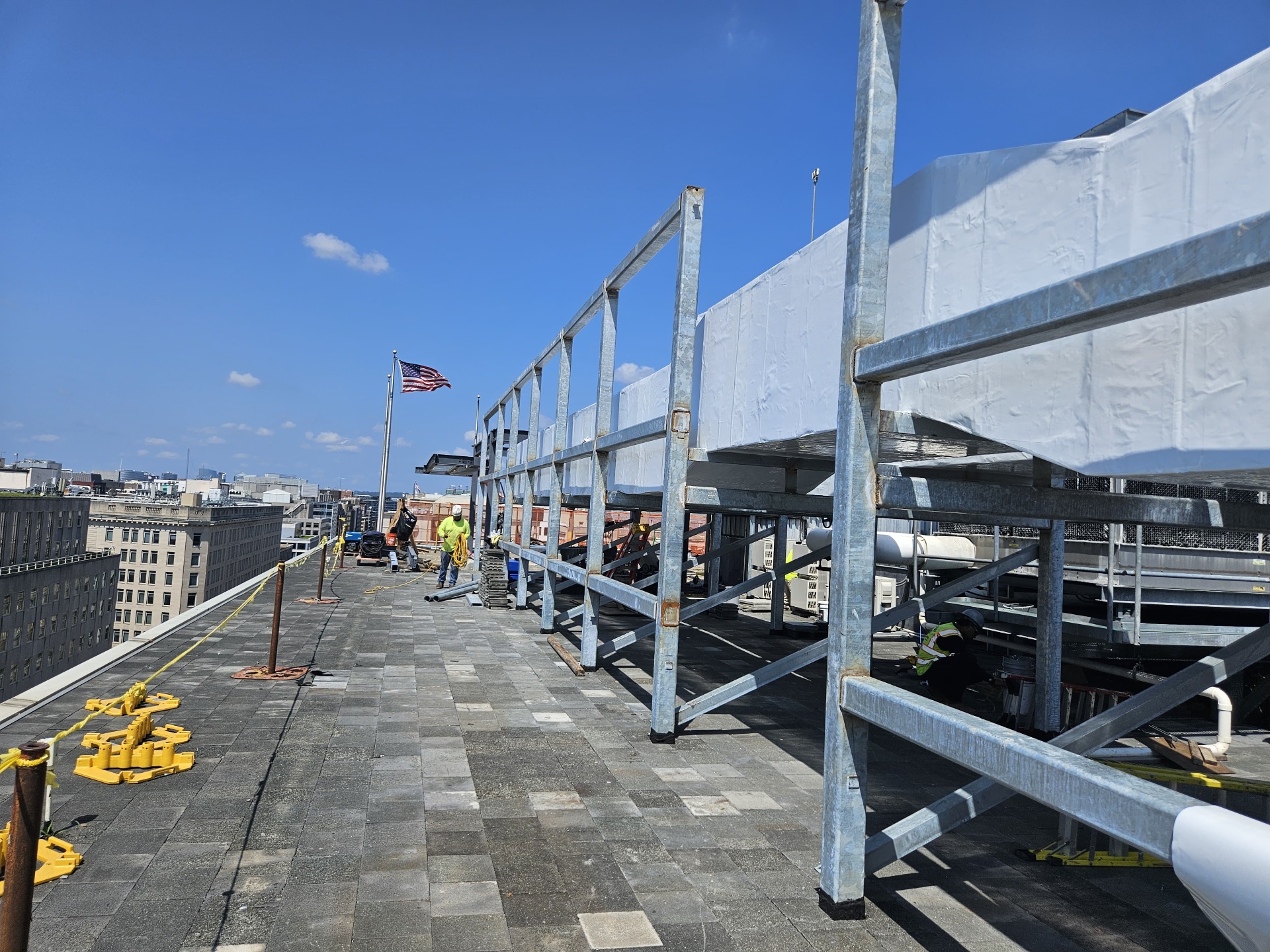 Rooftop steel scaffolding above the DC skyline